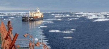 A vessel following an icebreaker in the Arctic Ocean © Tschudi Shipping