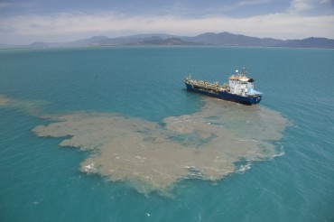 The Brisbane, a cutter suction dredge barge, dumping dredge material from the Port of Cairns in the Great Barrier Reef World Heritage Area © Xanthe Rivett - CAFNEC - WWF-Au