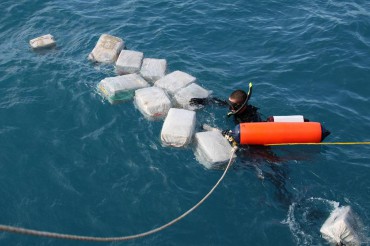 Floating bundles of cocaine are not rare in the Caribbean Sea. But they are not lost. The sea currents will safely bring them back to shore so they can be picked back up and continue their route north © U.S. Navy