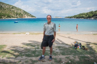 John Crawshaw stands in front of the bay, which is Athera's natural port. "Odysseus Unbound"'s hypothesis is that this very bay of Phorkys should be where Odysseus arrived © Philippe Henry / OCEAN71 Magazine