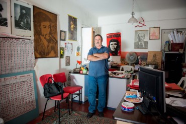 Nontas Mavrokefalos standing in Ithaca's KKE headquarters. The small room of the communist party displays many treasures, maybe more than the Vathy museum just a few doors down the street © Philippe Henry / OCEAN71 Magazine