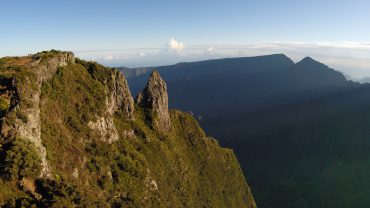 The Maïdo lookout at sunrise offers some of the best views of Réunion Island. The steep hills that have been sculpted by erosion over the centuries are covered in lush vegetation © Andy Guinand / OCEAN71 Magazine